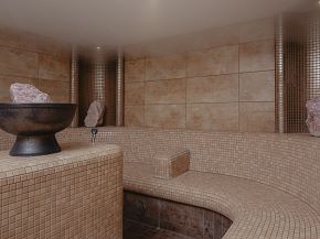 In the sauna of your spa hotel in Scheffau in the Wilder Kaiser.